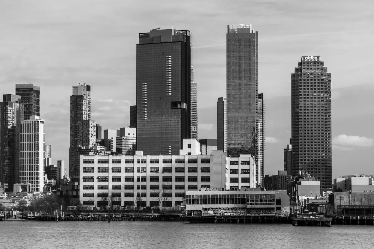Black-and-white view of the Long Island City, Queens skyline along the East River